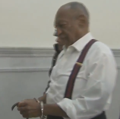 Bill Cosby in cuffs