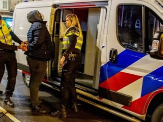 Netherlands arrests of rioters defying curfew