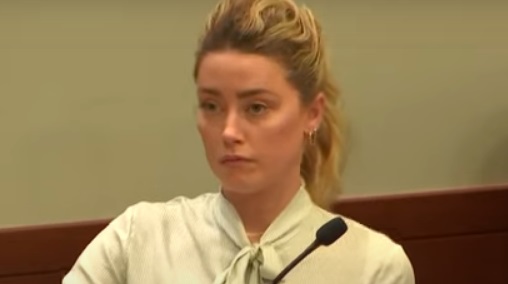 Amber Heard watches Depp testify