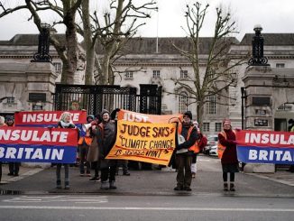 Insulate Britain supporters outside Inner London Crown Court