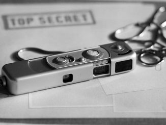spy camera on top secret folder