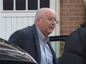 Peter Murrell arrives home after being charged