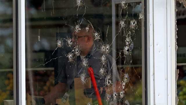 Arkansas mass shooting window damage