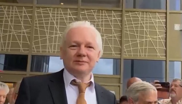 Julian Assange leaves court a free man