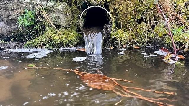 sewage discharge into river