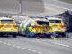 Five vehicle crash involving four police cars