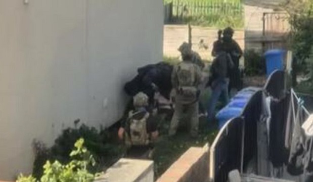 UK Counter Terror police making an arrest UK Counter Terror police making an arrest