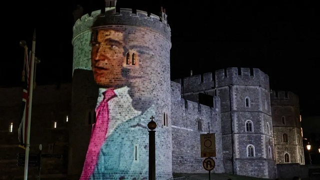 Donald Trump and Jeffrey Epstein projected onto Windsor Castle