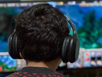 boy gamer with headphones