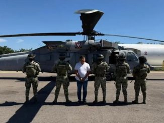 Audias Flores Silva being transported to secure facility