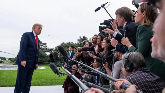 Donald Trump speaking to the media