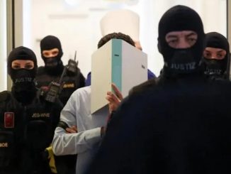 Beran A being led into court in Wiener Neustadt